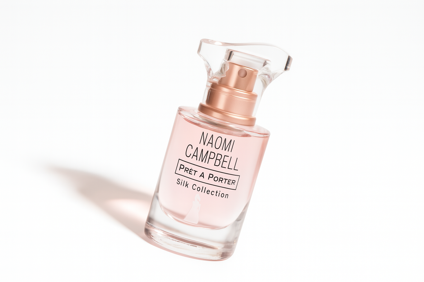 Naomi Campbell Pêt à Porter FLakon, leicht gekippt auf weißem Hintergrund.